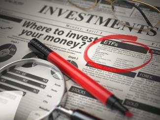 Newspaper article with a red circle around a section about ETFs